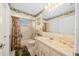 Updated bathroom with a tub, shower and a neutral color scheme at 10820 Sw 87Th Ter, Ocala, FL 34481