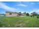 House with a large backyard and screened porch at 10820 Sw 87Th Ter, Ocala, FL 34481