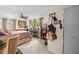Main bedroom with a comfortable bed and plenty of natural light at 10820 Sw 87Th Ter, Ocala, FL 34481