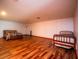 Large bedroom with wood-look floors and two beds at 24750 Ne 177Th Ter, Fort Mc Coy, FL 32134