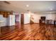 Spacious basement features wood-look flooring, a kitchen, and a large living area at 24750 Ne 177Th Ter, Fort Mc Coy, FL 32134