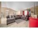 Bright living room with sectional sofa and large windows at 25 Cedar Ter, Ocala, FL 34472