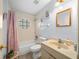 Clean bathroom with a tub, toilet and vanity at 25 Cedar Ter, Ocala, FL 34472
