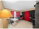 Home office with desk, shelving, and ample natural light at 25 Cedar Ter, Ocala, FL 34472