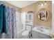 Clean bathroom with a shower/tub combo and vanity at 25 Cedar Ter, Ocala, FL 34472