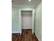 Spacious closet with double doors and ample hanging space at 8028 Se 62Nd Ln, Ocala, FL 34472