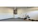 Clean and spacious garage with ample storage space and epoxy floor at 8028 Se 62Nd Ln, Ocala, FL 34472