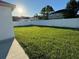 Large backyard with grassy area and patio at 8028 Se 62Nd Ln, Ocala, FL 34472