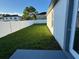 Backyard with grassy area and patio at 8028 Se 62Nd Ln, Ocala, FL 34472