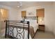 Inviting bedroom with metal bed frame and ensuite bathroom access at 12750 W Highway 40, Ocala, FL 34481