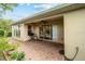Spacious patio with sliding glass doors leading to the backyard at 6470 Sw 50Th Ct, Ocala, FL 34474