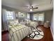 Bedroom with two twin beds, and plenty of natural light at 9526 Sw 72Nd Ct, Ocala, FL 34476