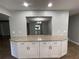 Kitchen counter with granite top and view into the dining area at 9526 Sw 72Nd Ct, Ocala, FL 34476