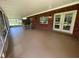 Screened porch with brick flooring and outdoor furniture at 9526 Sw 72Nd Ct, Ocala, FL 34476