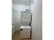 Laundry room with stackable washer and dryer at 9526 Sw 72Nd Ct, Ocala, FL 34476