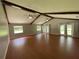 Large main bedroom with hardwood floors and multiple windows providing natural light at 9526 Sw 72Nd Ct, Ocala, FL 34476