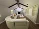 Gathering room with vaulted ceiling, fireplace, and built-in shelving at 9526 Sw 72Nd Ct, Ocala, FL 34476