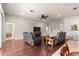 Living room with hardwood floors and views into another room at 5676 Sw 40Th Pl, Ocala, FL 34474