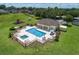 Community pool, spa, and lounge area with playground visible at 6470 Sw 50Th Ct, Ocala, FL 34474