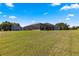 Elevated backyard offering scenic views of the surrounding area at 5615 Nw 202Nd Pl, Mc Intosh, FL 32664