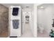 Bathroom with a shower, toilet, and access to the main bedroom at 5615 Nw 202Nd Pl, Mc Intosh, FL 32664