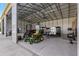 Spacious workshop with ample room for vehicles and equipment at 5615 Nw 202Nd Pl, Mc Intosh, FL 32664