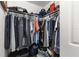Well-organized closet with ample hanging space and shelving at 5615 Nw 202Nd Pl, Mc Intosh, FL 32664