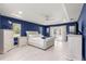 Main bedroom with a plush bed, dresser, and access to a private bathroom at 5615 Nw 202Nd Pl, Mc Intosh, FL 32664