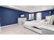 Main bedroom with a comfortable bed, built-in dresser, and plenty of closet space at 5615 Nw 202Nd Pl, Mc Intosh, FL 32664
