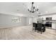 Open concept kitchen and dining area with modern appliances and breakfast bar at 2051 Nw 50Th Ave, Ocala, FL 34482