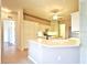 Spacious kitchen with island, stainless steel appliances, and white cabinets at 5858 Nw 27Th Pl, Ocala, FL 34482