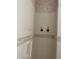 Shower stall with tiled walls and decorative border at 5858 Nw 27Th Pl, Ocala, FL 34482