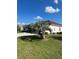 House exterior with palm tree and driveway at 5858 Nw 27Th Pl, Ocala, FL 34482