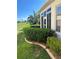 House exterior showcasing sunroom and landscaping at 5858 Nw 27Th Pl, Ocala, FL 34482