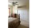 Spacious bedroom with large closet and ceiling fan at 5858 Nw 27Th Pl, Ocala, FL 34482