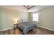 Comfortable bedroom with a ceiling fan and a double bed at 5456 Nw 64Th St, Ocala, FL 34482
