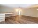 Bright bedroom with wood-look flooring and built-in bunk beds at 5456 Nw 64Th St, Ocala, FL 34482