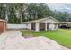 Detached carport with concrete slab and ample parking space at 5456 Nw 64Th St, Ocala, FL 34482