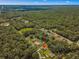 Property located in a residential neighborhood with lush greenery at 4980 Sw 195Th Ave, Dunnellon, FL 34431