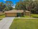 Charming single story home with stone accents and a teal front door at 4980 Sw 195Th Ave, Dunnellon, FL 34431