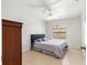 Cozy bedroom with a queen-size bed and ceiling fan at 4980 Sw 195Th Ave, Dunnellon, FL 34431
