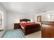 Spacious bedroom with a king-size bed and ensuite bathroom at 4980 Sw 195Th Ave, Dunnellon, FL 34431