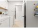 Laundry room with washer, dryer, and extra storage at 4980 Sw 195Th Ave, Dunnellon, FL 34431