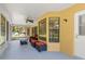 Screened porch with ceiling fan and access to backyard at 4980 Sw 195Th Ave, Dunnellon, FL 34431