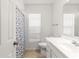 Simple bathroom with a shower/tub combo and white vanity at 4980 Sw 195Th Ave, Dunnellon, FL 34431