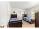 Bedroom with two twin-size beds and ample closet space at 4980 Sw 195Th Ave, Dunnellon, FL 34431