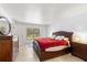 Bright bedroom with a king-size bed and ample natural light at 4980 Sw 195Th Ave, Dunnellon, FL 34431