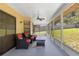 Spacious screened-in porch overlooking the backyard at 4980 Sw 195Th Ave, Dunnellon, FL 34431