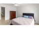 Simple bedroom with a queen-size bed and ceiling fan at 4980 Sw 195Th Ave, Dunnellon, FL 34431