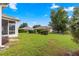 Spacious backyard with lush green grass and nicely manicured hedges at 9882 Sw 89Th Lane Rd, Ocala, FL 34481